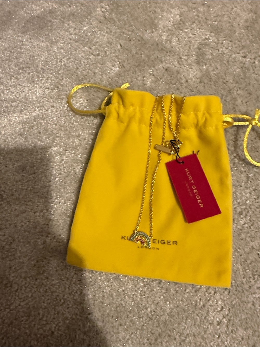 Kurt Geiger Gold Rainbow Necklace with Yellow Pouch